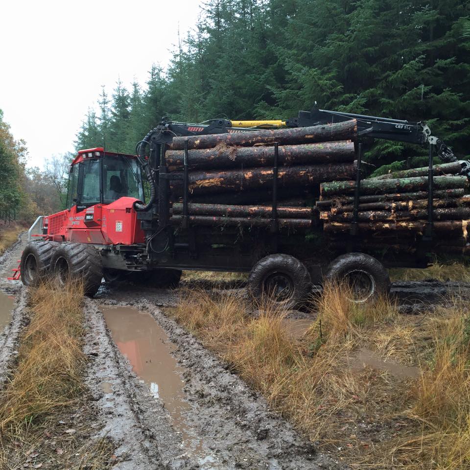 Muddy Road with forestry contractors in Devon